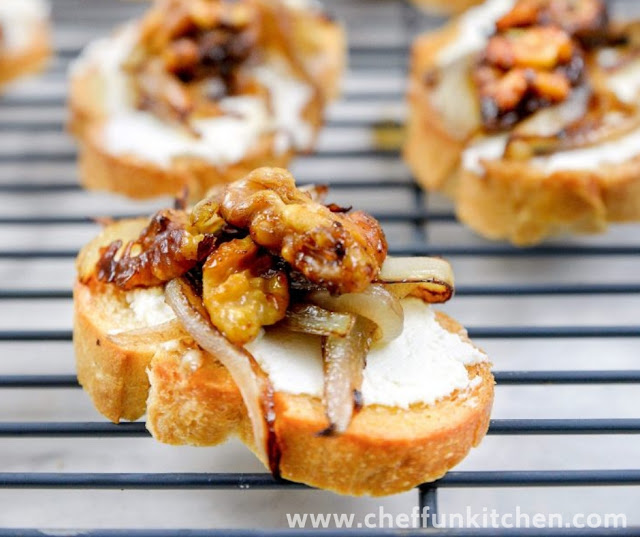 Goat Cheese Crostini With Candied Walnuts And Caramelized Onions
