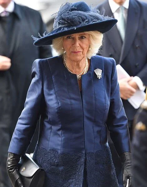 The Countess of Wessex wore Roland Mouret Millington wool crepe coat. The Duchess of Cornwall and the Duke of Cambridge