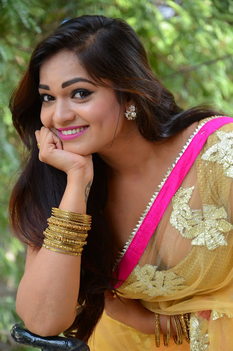 Ashwini Cleavage in Yellow Saree