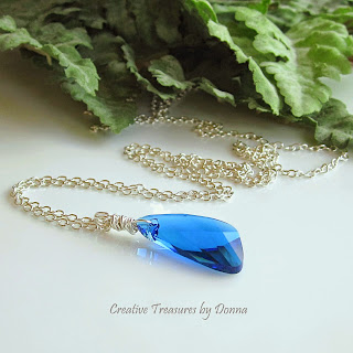 https://www.etsy.com/listing/209777254/blue-swarovski-crystal-wing-pendant?ref=shop_home_active_9