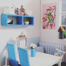 One-twelfth scale modern miniature cafe scene, in blue and white with a bird theme.