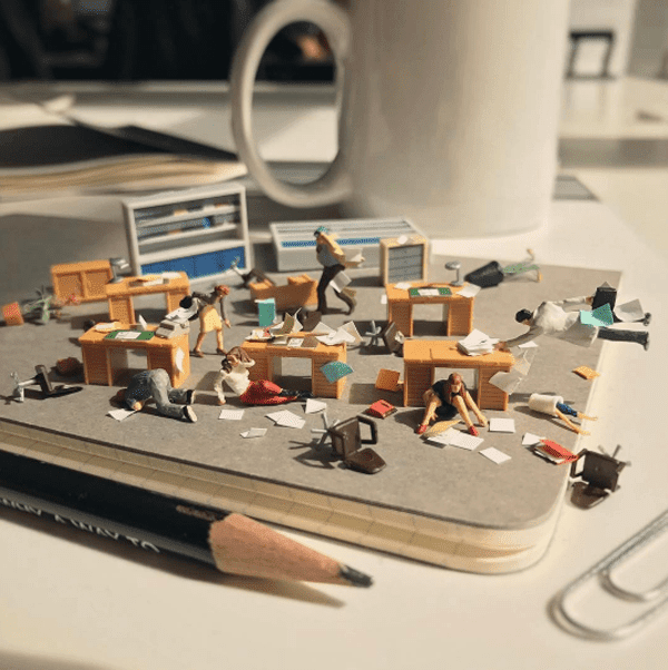 Miniature Scenes Set Amongst Office Supplies