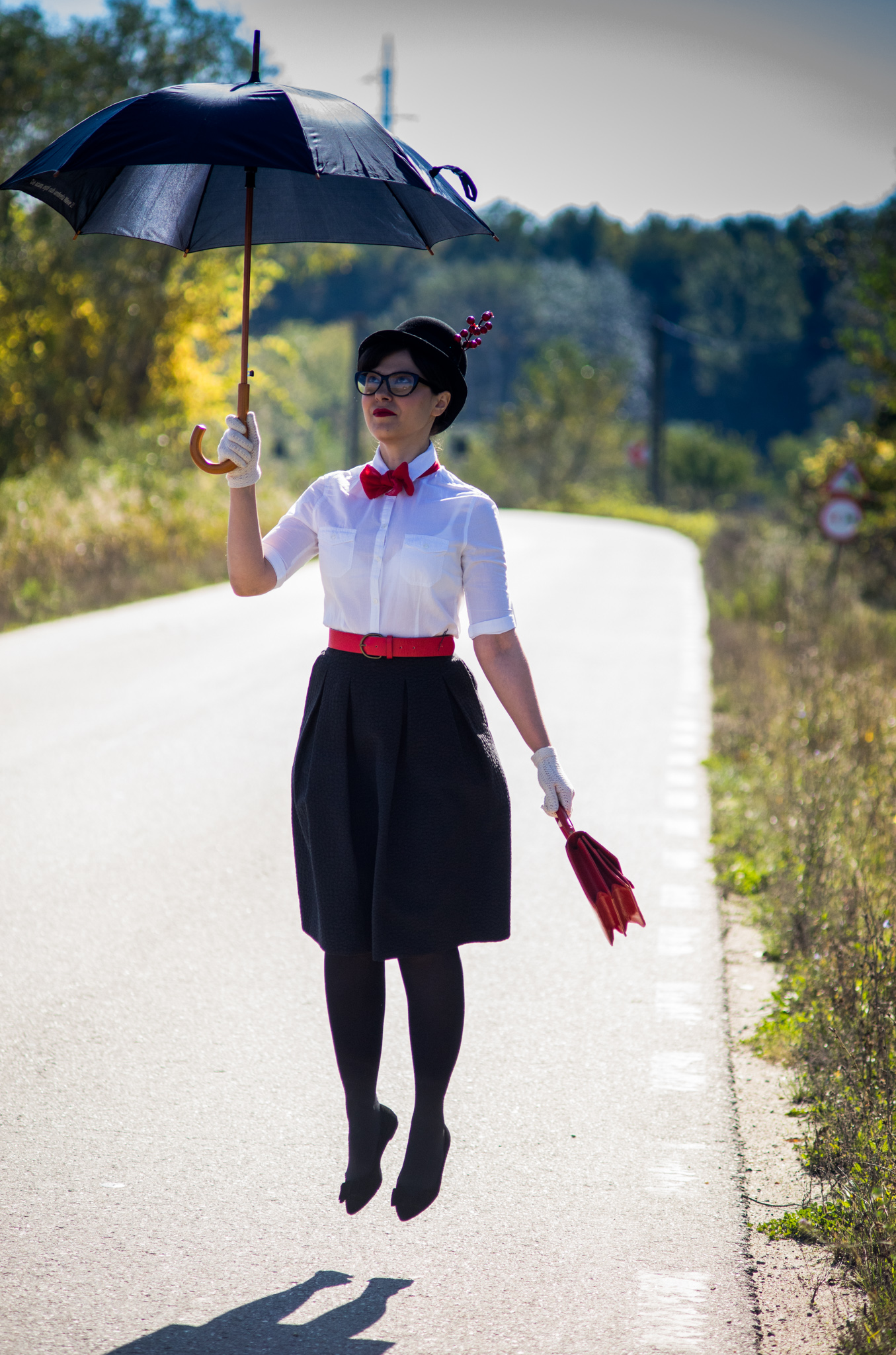 Easy DIY Halloween Costume Mary Poppins white shirt terranova black midi skirt H&M black flats H&M red vintage bag black umbrella tall hat cat eye glasses red belt photoshoot flying