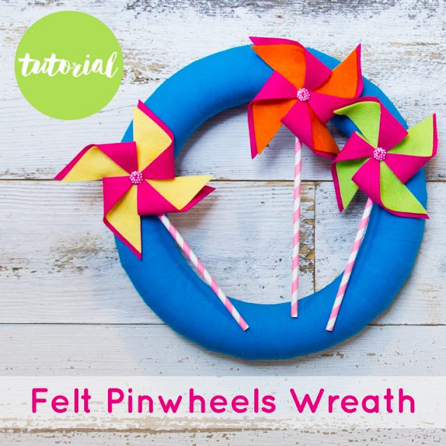 https://www.thevillagehaberdashery.co.uk/blog/2017/a-year-of-wreaths-july-felt-pinwheels-wreath-by-laura-howard