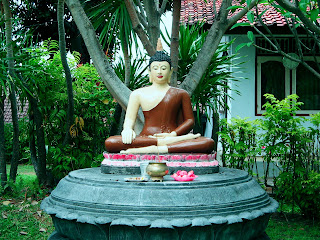 Buddha Statue In The Garden Brahmavihara Arama