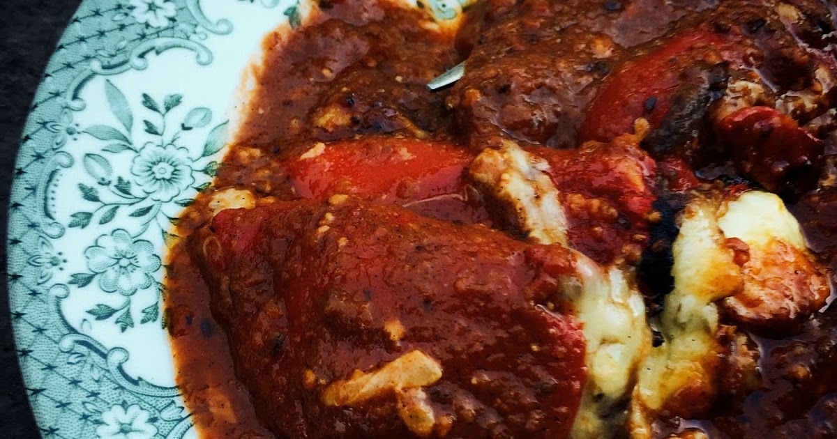 Piquillo Peppers Stuffed with Refried Beans on ChipotleVanilla Sauce