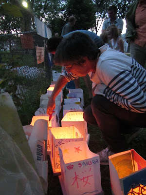 Hiroshima Day Kingston Peace Lantern Ceremony lighting the lanterns