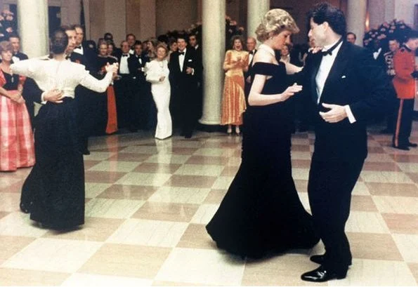 Princess Diana dances with John Travolta, Nancy Davis Reagan, Ronald Reagan. Princess Diana visit Italy  wore Emanuel blue tartan suit. blue velvet Victor Edelstein evening gown at Whitehouse