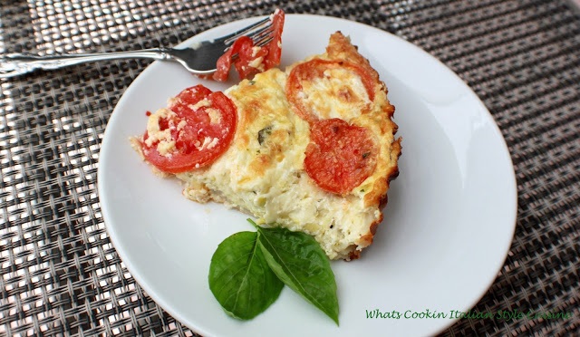 this is a pastry crust tart like quiche filled and baked with mozzarella cheese, zucchini shredded and sliced tomatoes in a rich egg filling into the crust and baked