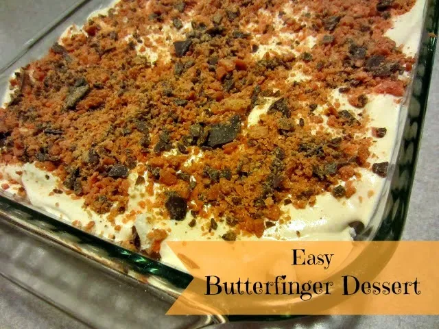 The original Butterfinger Dessert by Renee's Kitchen Adventures in a clear glass baking pan