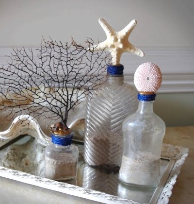 bottles with shells and sea life
