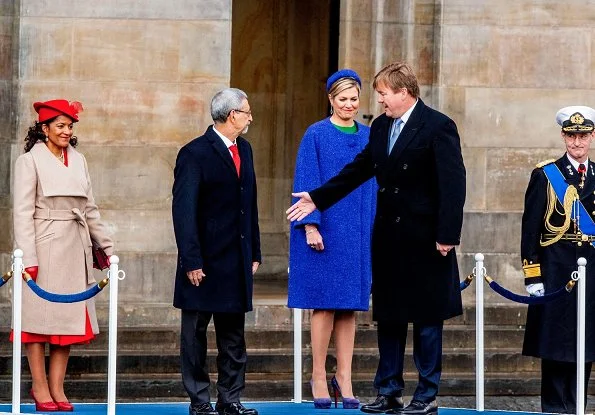 Queen Maxima wore Natan coat from Fall Winter collection and Natan green dress. First Lady Lígia Dias Fonseca