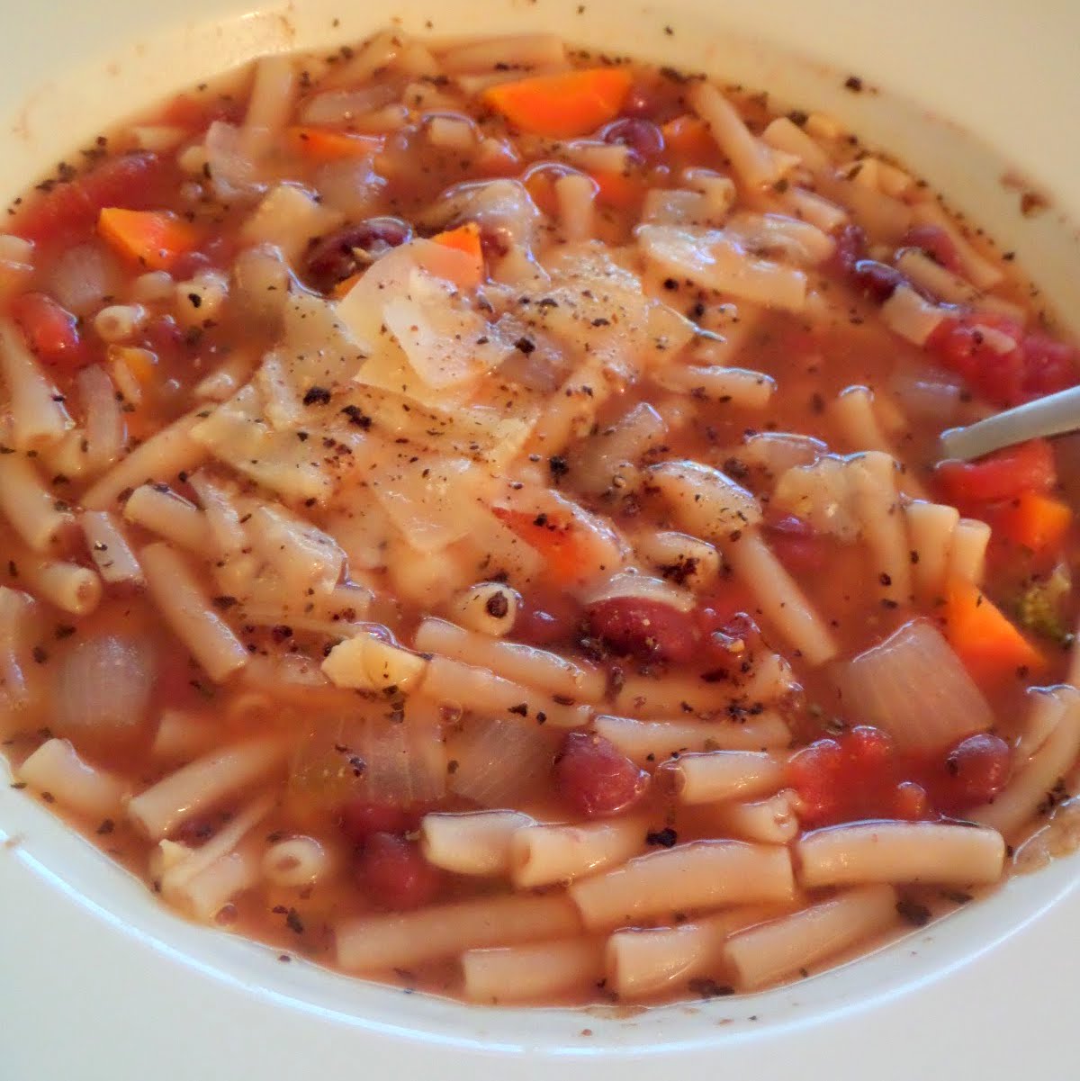 Minestrone Soup:  A simple, vegetarian, Italian style soup made with vegetables, beans, pasta, tomatoes and spices.