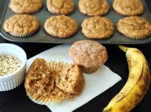 banana muffins with a banana and bowl of oats 