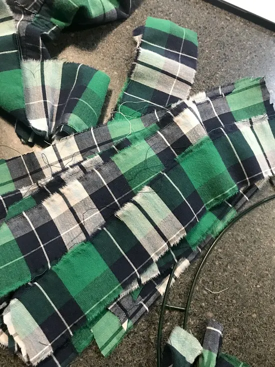 strips of green plaid pajama pants