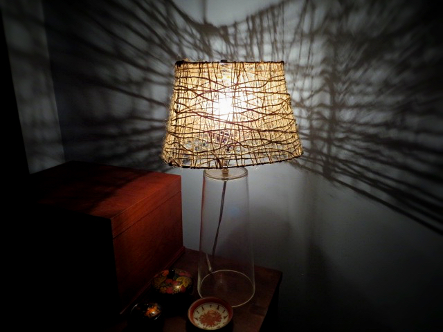 cool shadows created by lit jute twine lampshade