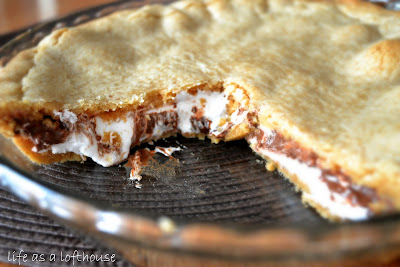 S'mores Pie has a delicious graham cracker crust and is filled with melty chocolate and gooey marshmallows. Life-in-the-Lofthouse.com