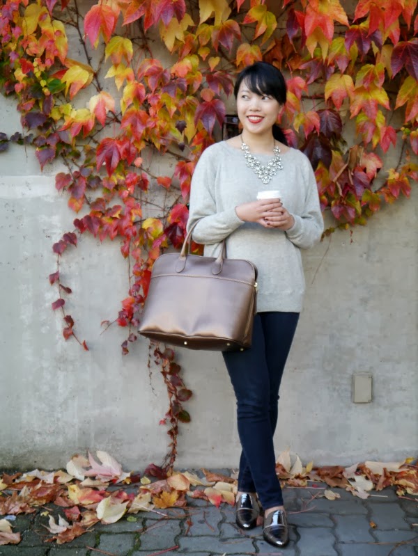 Grey J. Crew cashmere sweater worn with sparkly J. Crew statement necklace, dark wash skinny jeans, 3.1 Phillip Lim silver metallic loafers, a custom gold saffiano leather bag from Roots, and red Dior lipstick.