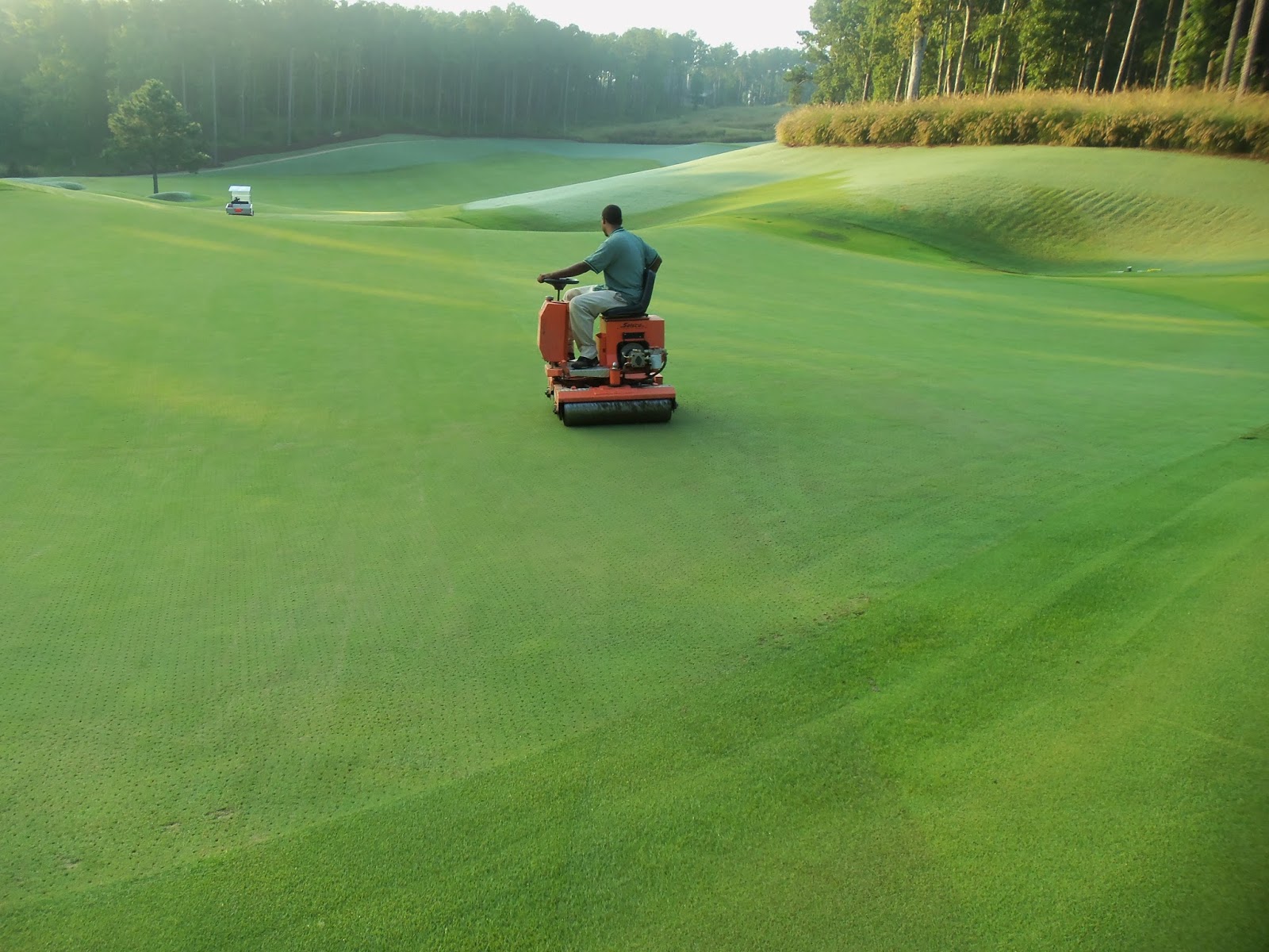 The Creek Club Golf Course Maintenance Greens Aerification Sept 4, 2013
