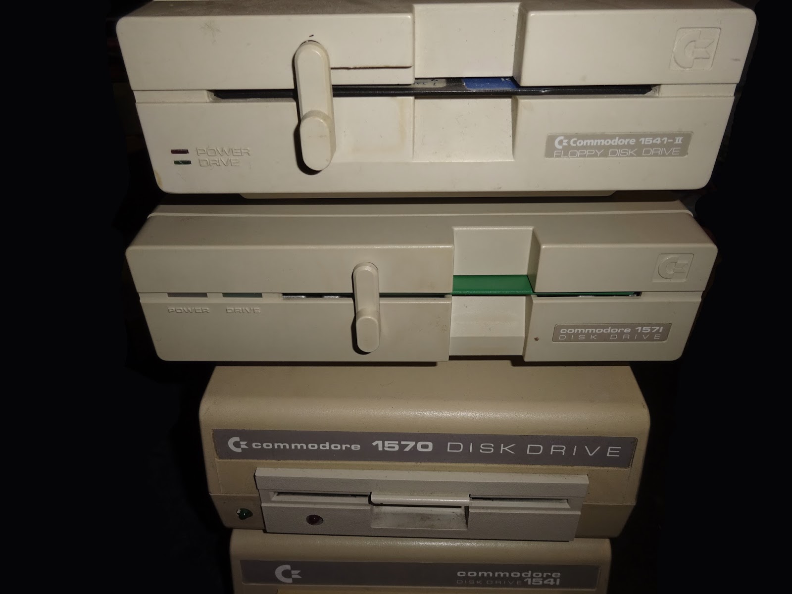 The reason it's larger than the 1541-II is they have returned to having an internal power supply. On the back is AC in, power switch, IEC connectors and ...