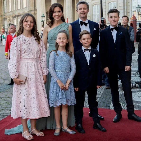 Crown Princess Mary wore a gown by Jesper Høvring. Princess Marie wore a gown by Rikke Gudnitz. Princess Isabella, Princess Alexandra