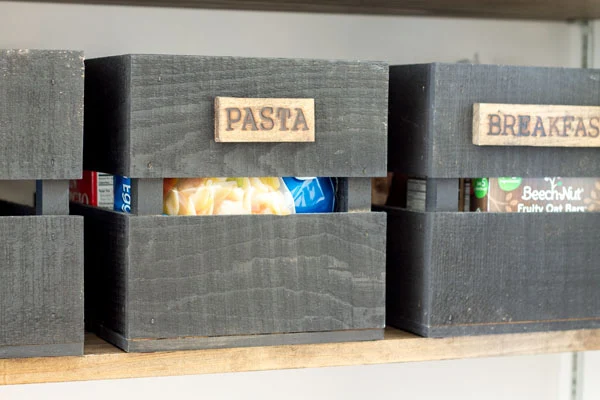How to organize a small pantry. Get modern farmhouse style with DIY wood burned food storage crates.