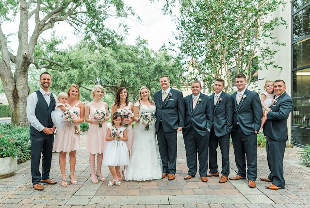 pink wedding party groomsmen, bridesmaids and flower girls