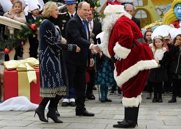 Prince Albert II, Princess Charlene, Louis Ducruet and Camille Gottlieb attended Children's Christmas ceremony