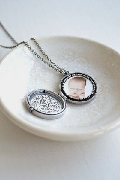 http://www.whitetrufflestudio.com/collections/mother-s-day-collection/products/monogram-photo-locket-necklace-style-503