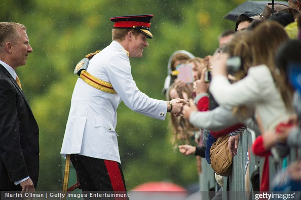 Prince Harry greets members of the public outside the Australian War Memorial