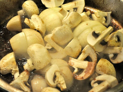 Red wine crock pot beef roast mushrooms in pot 