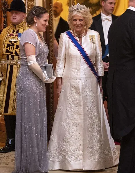 Kate Middleton wore a velvet Alexander McQueen gown, the Lover's Knot tiara, the Nizam of Hyderabad necklace