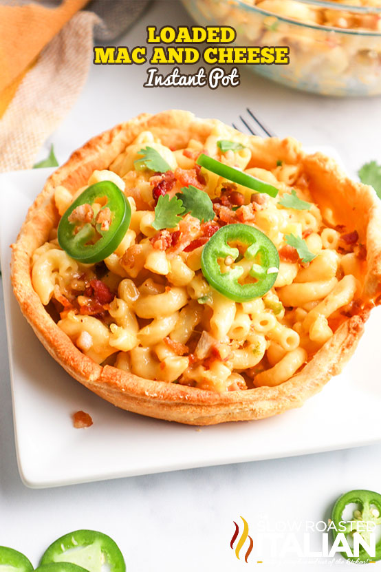 Loaded mac and cheese made in an Instant Pot  served in a bread bowl
