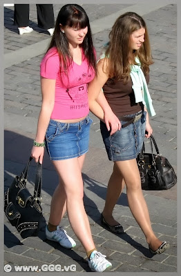 Girls in denim skirt on the street