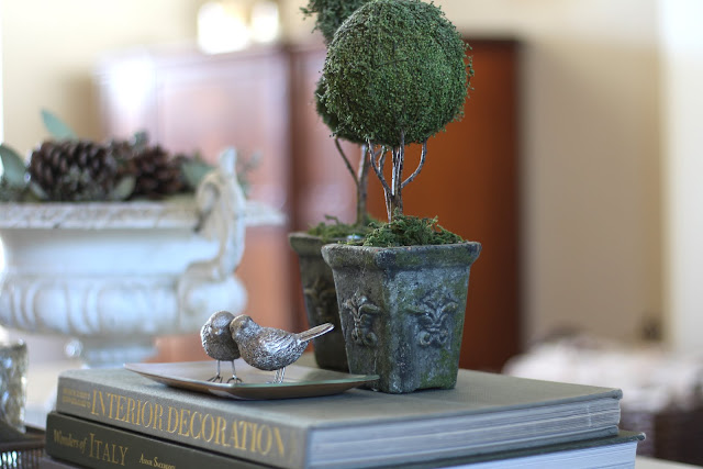 styling a coffee table topiaries silver birds fall