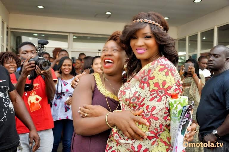 omotola autograph signing abuja