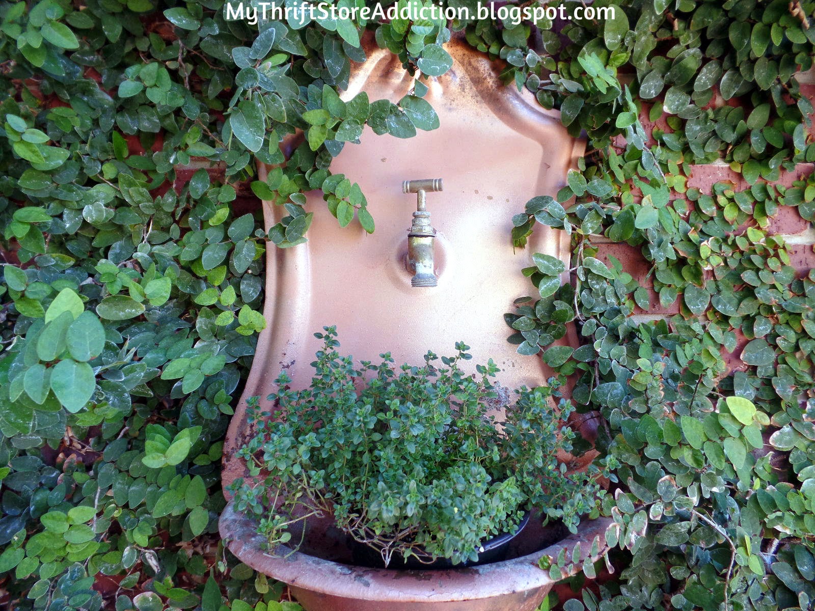 Repurposed fountain planter