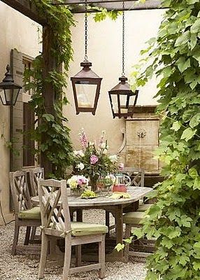 Breathtaking European outdoor garden dining room found on Hello Lovely Studio