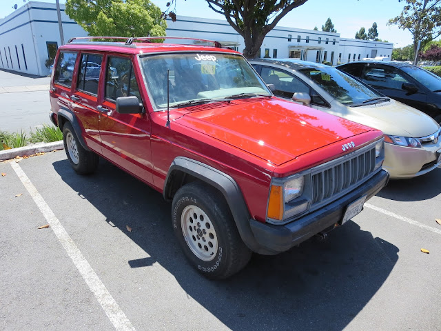 Shiny paint after rust repairs on Jeep Cherokee at Almost Everything Auto Body