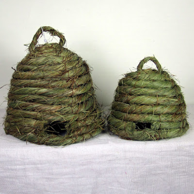 http://www.outerbankscountrystore.com/bee-skeps-straw-beehives-spring-decorations-set-of-2/