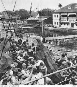 Japanese troops landing on Labuan Island, 14 January 1942 worldwartwo.filminspector.com
