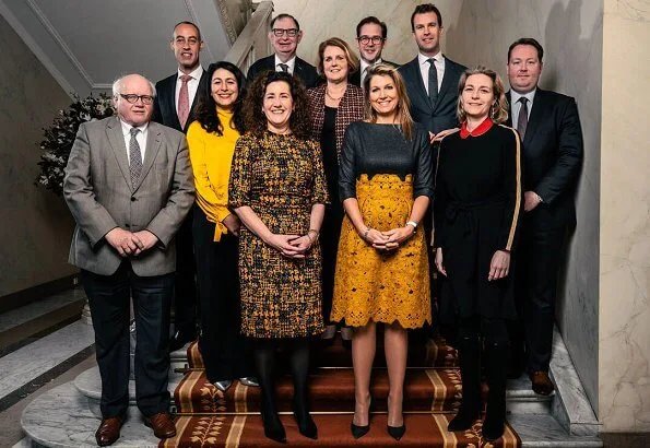 Minister Ingrid van Engelshoven. Queen Maxima wore a yellow lace skirt by Natan Edouard-Vermeulen. Claes Iversen serval elegant lace skirt