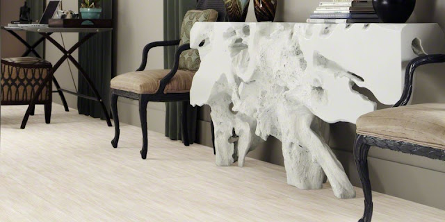 Wood or luxury vinyl? It can be hard to tell with this beautiful floor.