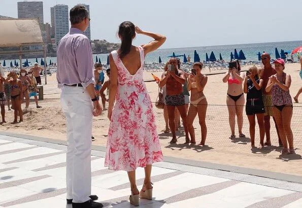 Queen Letizia wore Adolfo Dominguez floral print dress. Macarena espadrille wedges. Levante beach in Benidorm
