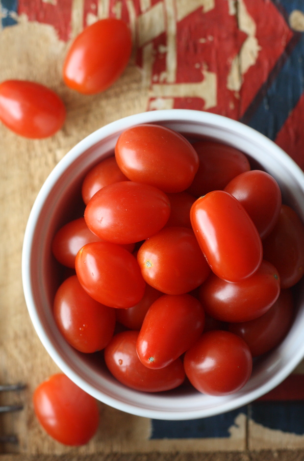 cherry tomatoes in white bowl
