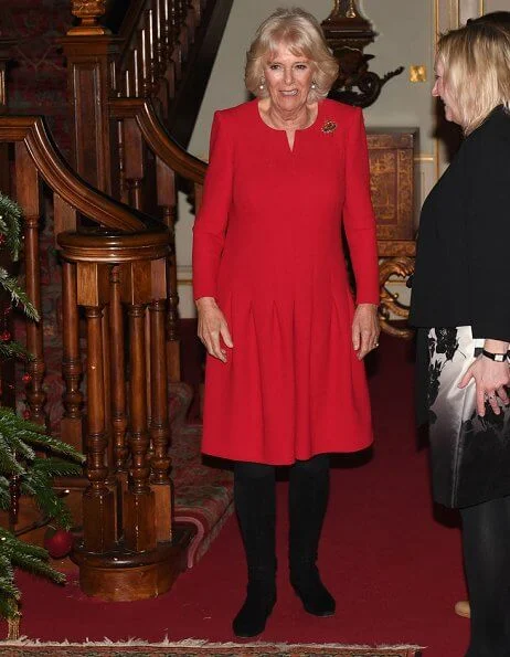 The Duchess of Cornwall is the patron of Helen and Douglas House and Roald Dahl Charity. red dress