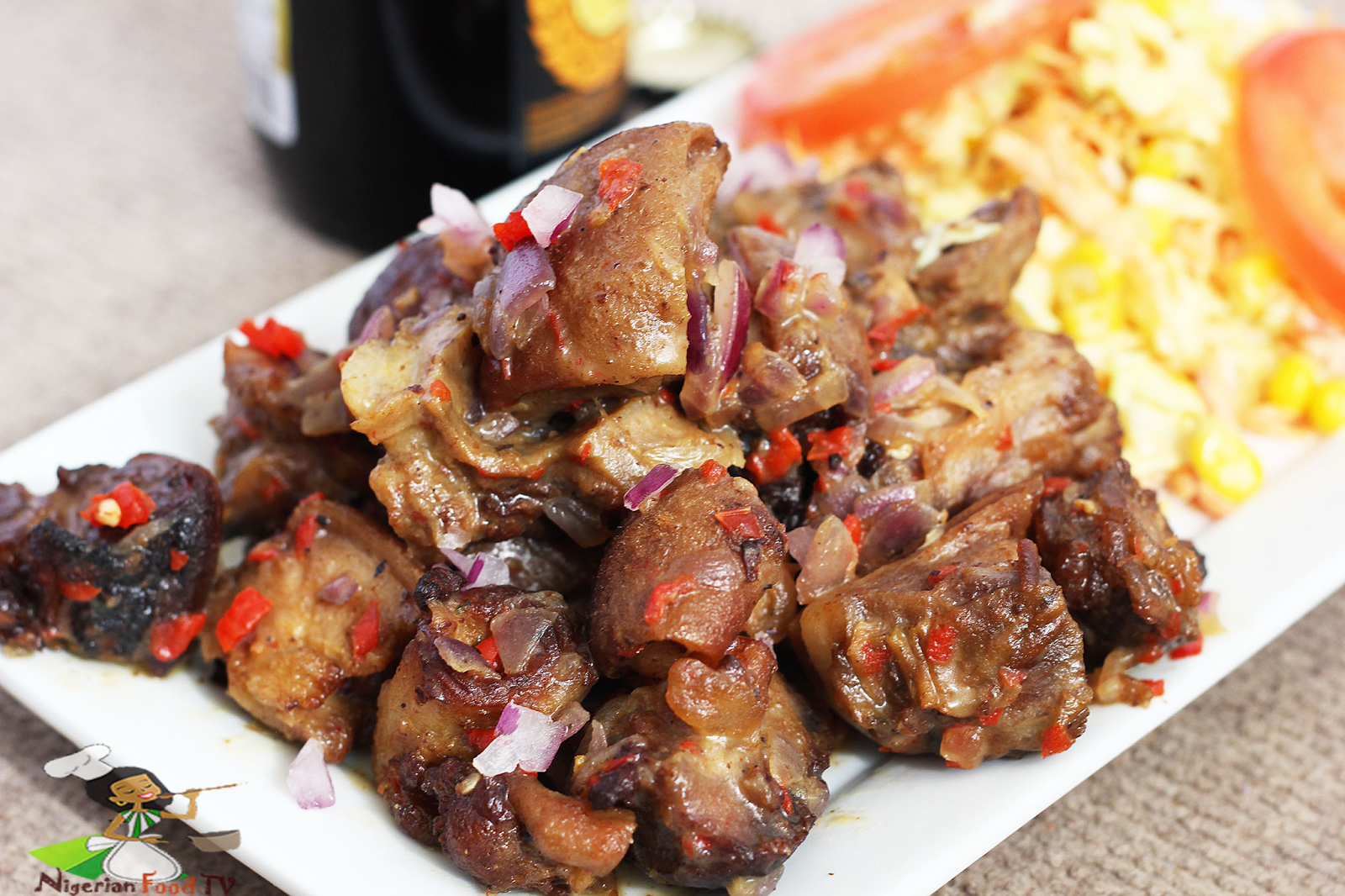 nigerian Asun Recipe ( spicy smoked peppered goat meat) | Nigerian Small Chop