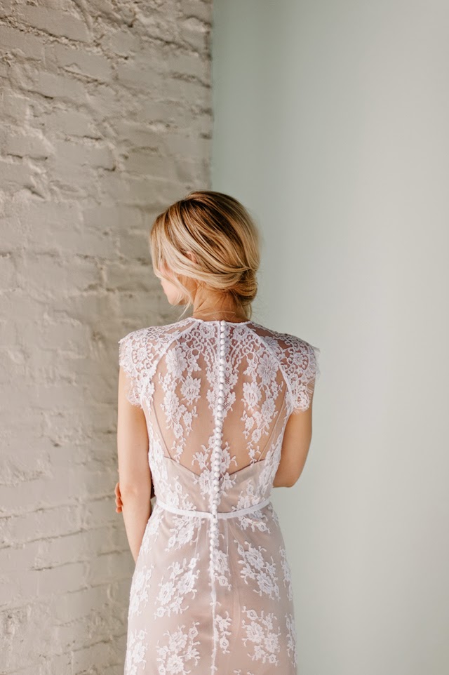 buttons down the back of a boho lace wedding dress