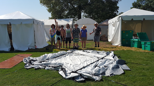 ShelterBox Team building the tent - Bonnaroo Chris 2015