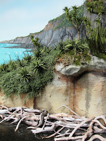 Diorama of bush by the sea.